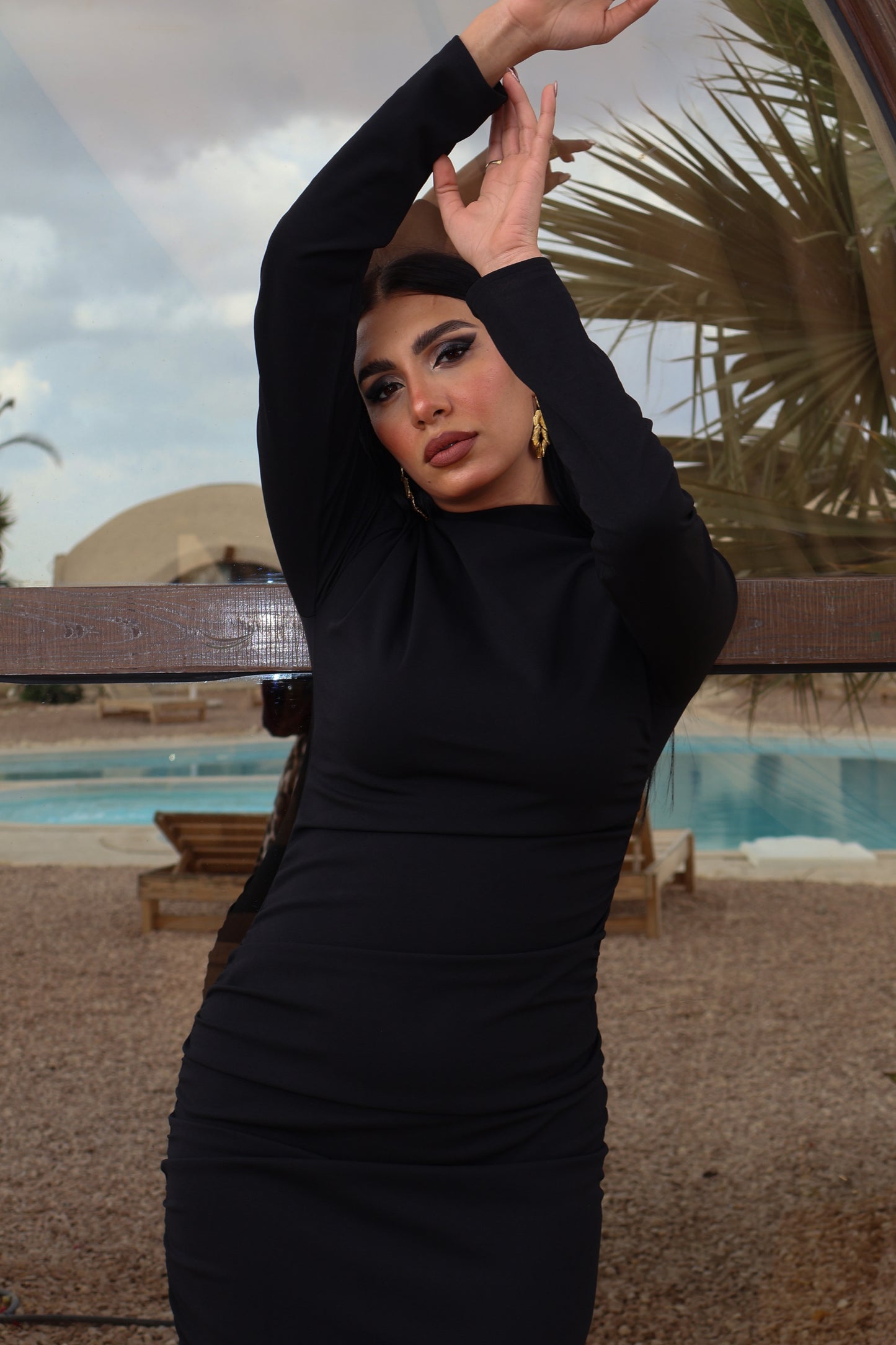 Black long-sleeve draped dress
