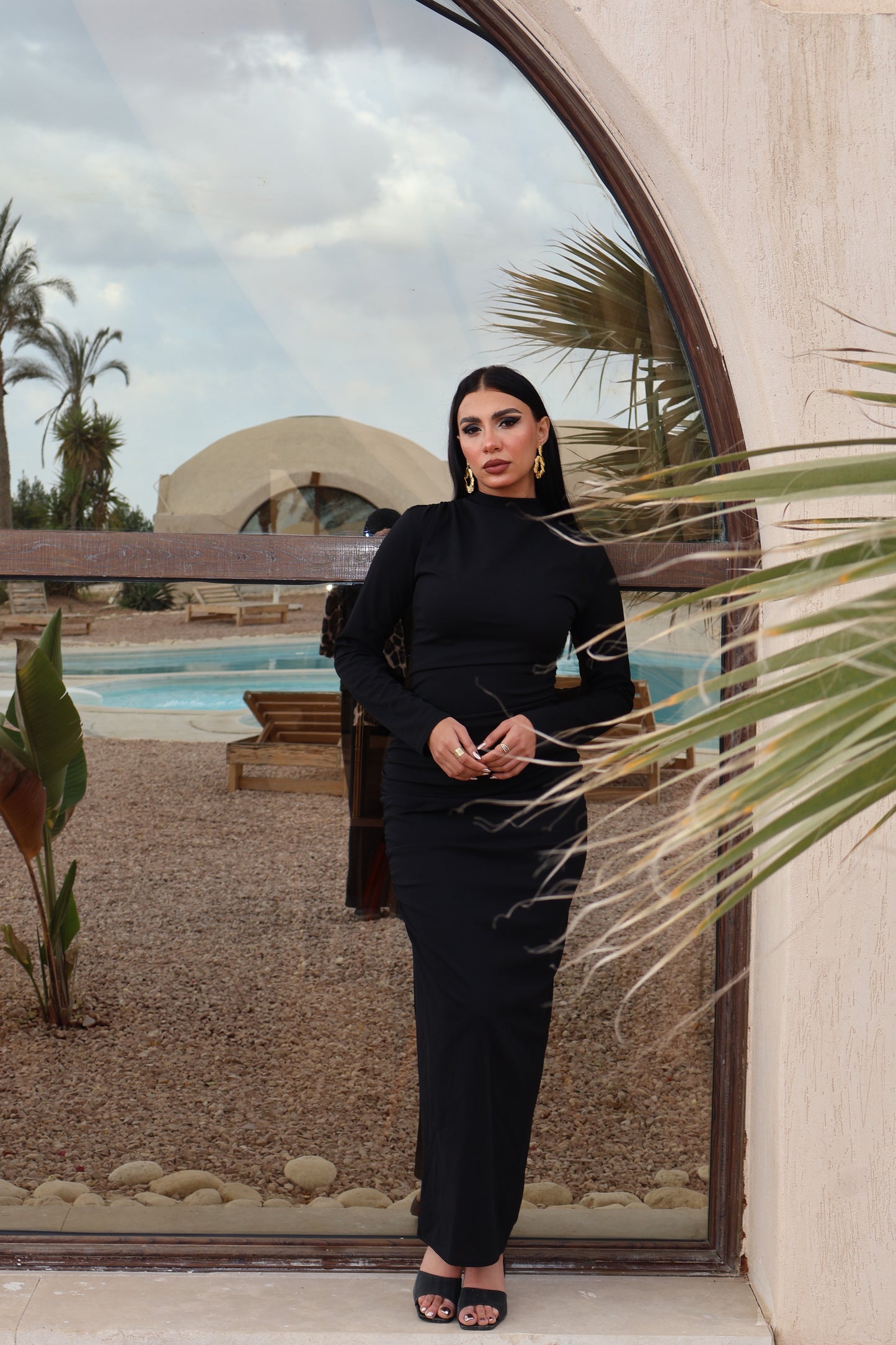 Black long-sleeve draped dress